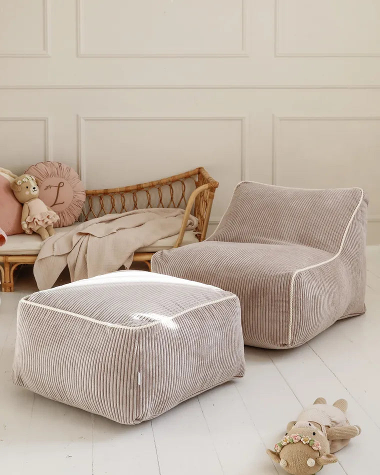 Kumo Chair and Ottoman in Candy in a child's room