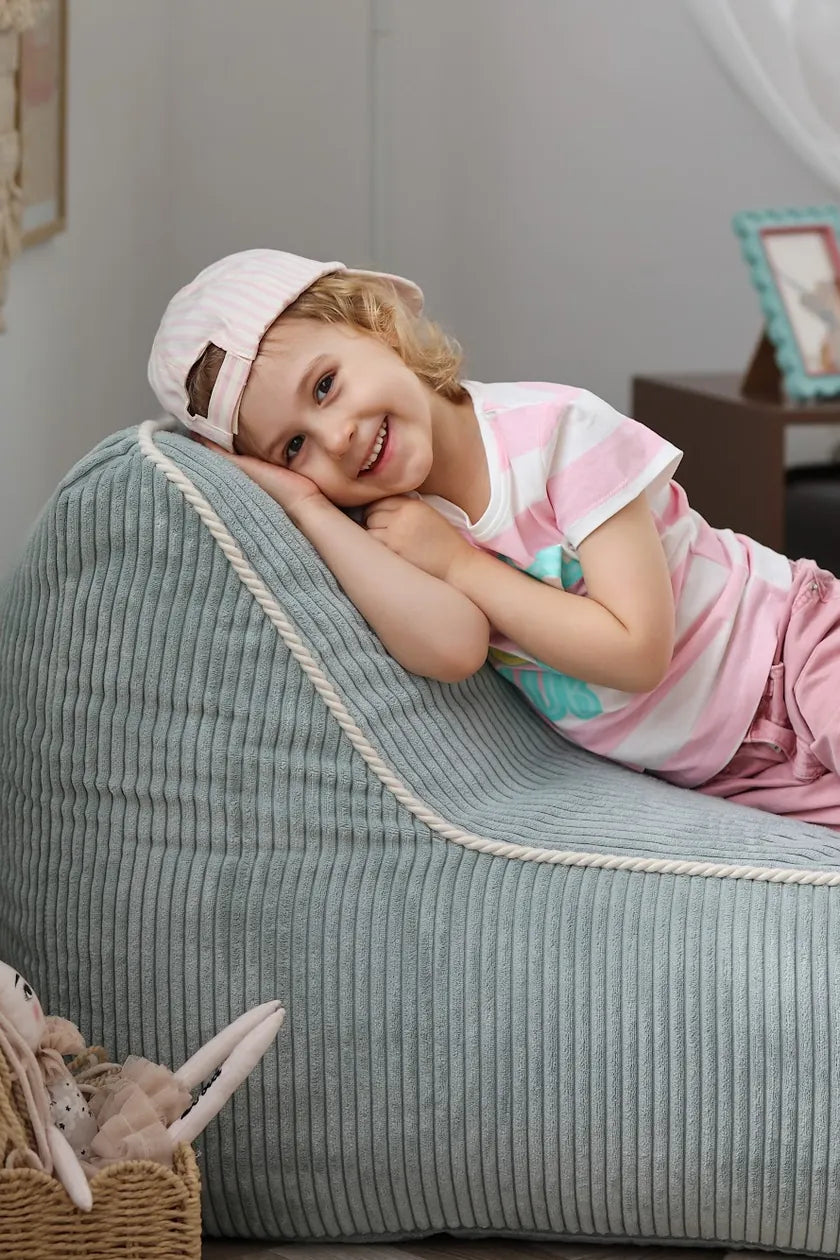 Girl lounging in Kumo Chair Peppermint
