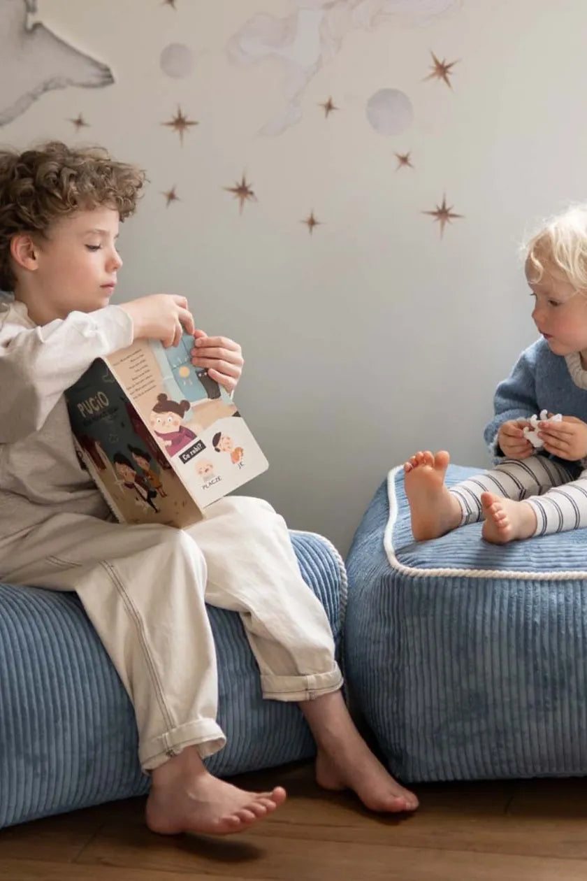 Two children on Kumo Chair and Ottoman Sky Sugar
