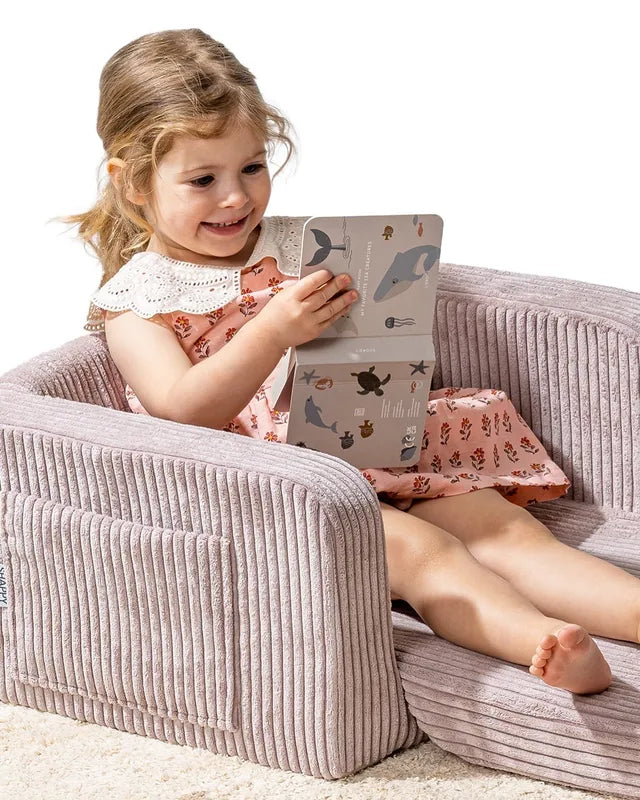 Child playing on Lumi Chair Corduroy