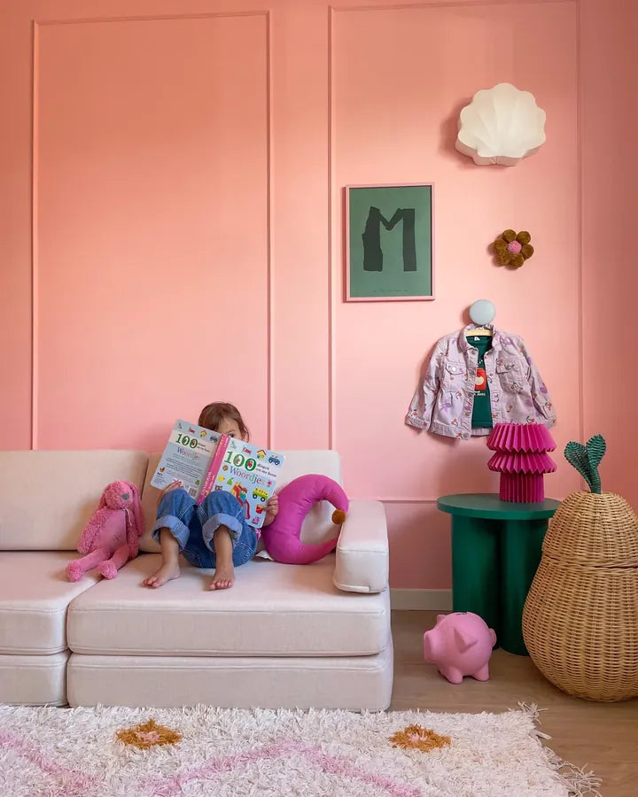 Child reading on Play Sofa Original in Soft Pink