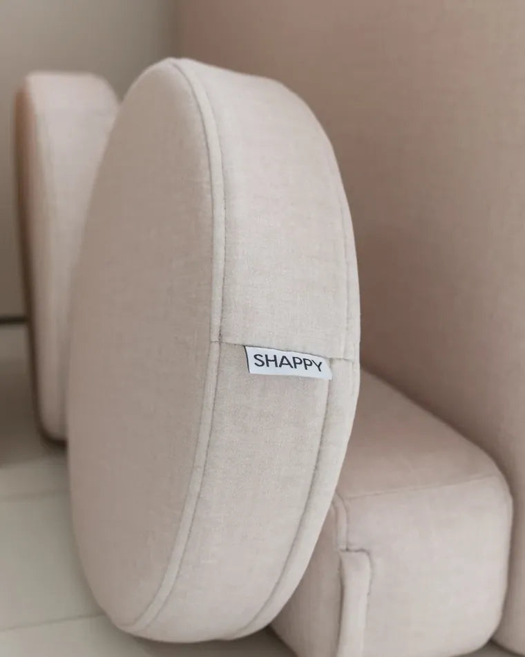 Double-stitched edge and SHAPPY label on an Ultra Plush cushion in Soft Beige