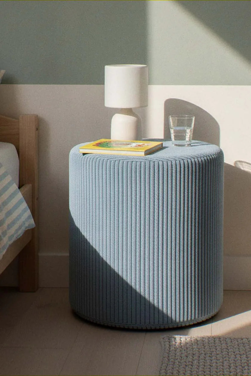 Shappy Pouf Corduroy Sky Sugar with a lamp next to a bed