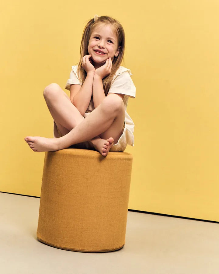 Girl sitting on Shappy Pouf Ultra Plush Mustard