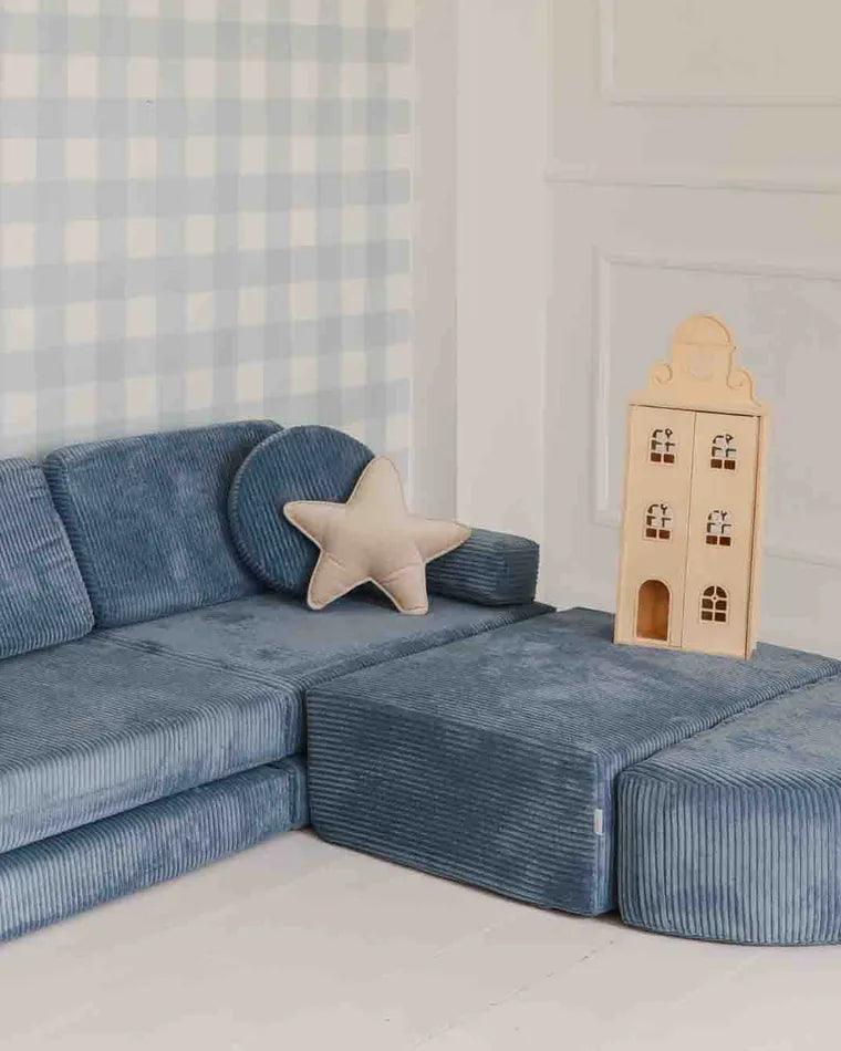 Rocker Corduroy in Sky Sugar next to a play sofa