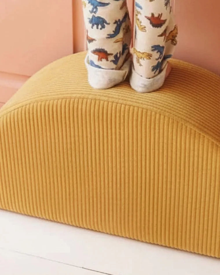 Child standing on the Rocker Corduroy in Honey