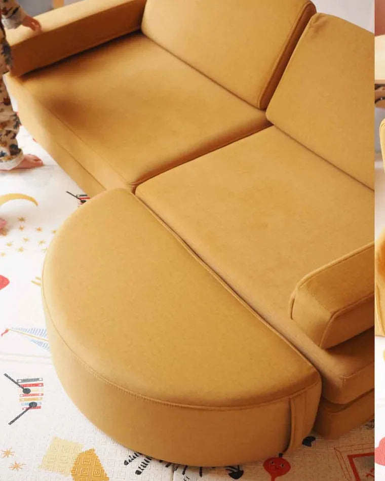 Rocker in Mustard at the end of the opened play sofa