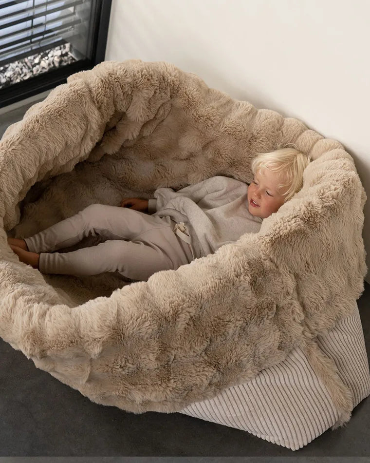 Child lying in the Snuggle Bag