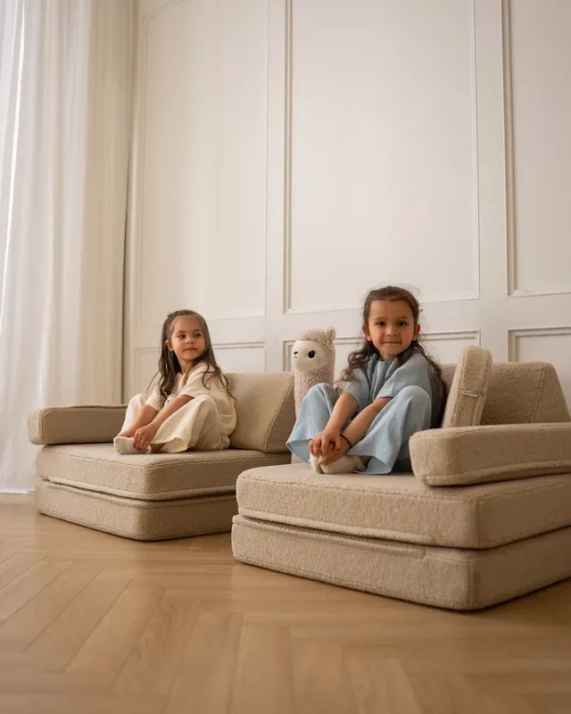 Two children sitting on Play Sofa Original Teddy