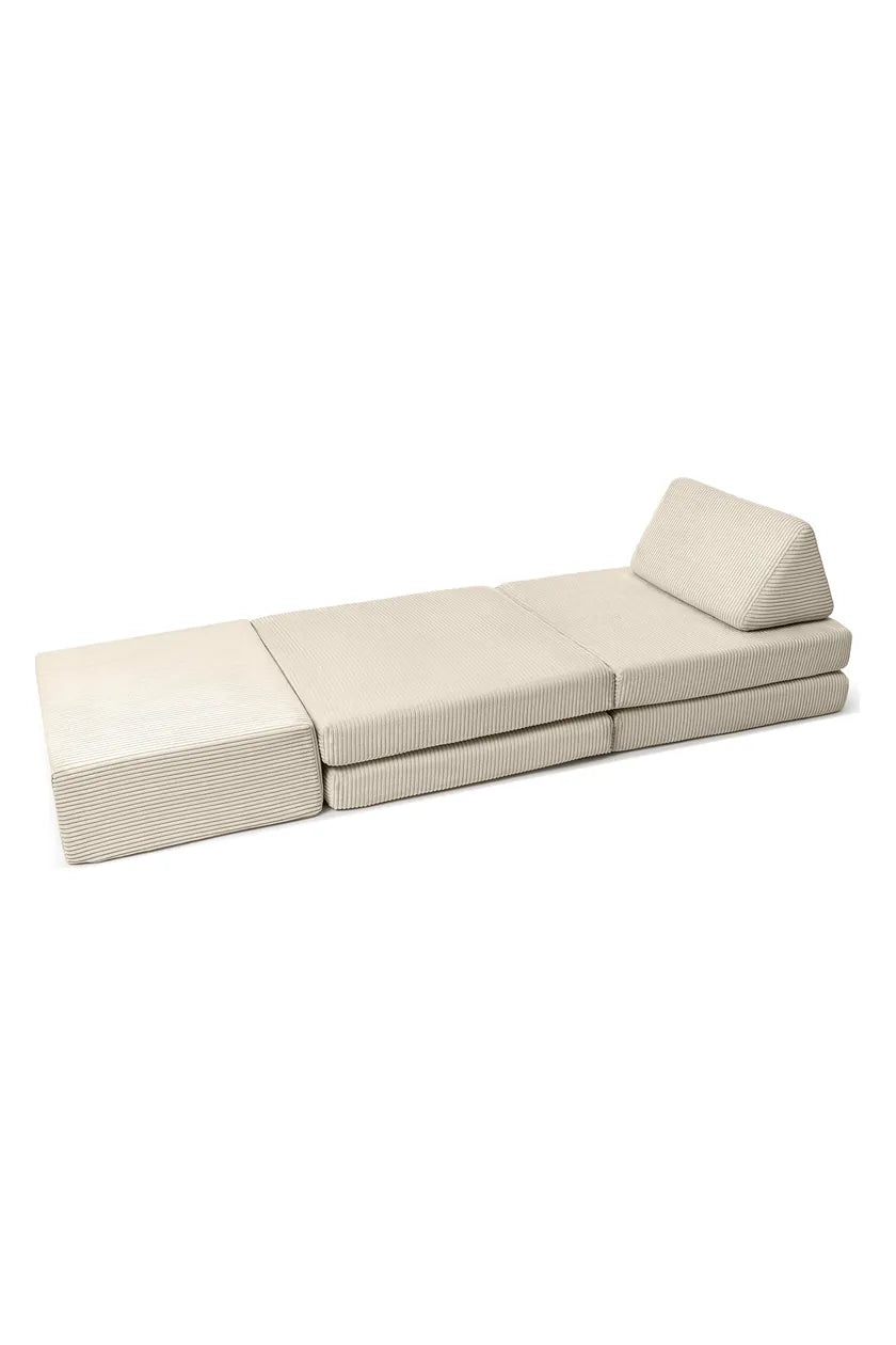 Trampoline and Play Sofa pieces laid out flat as a guest bed