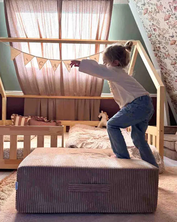 Boy jumping on Trampoline Pure Corduroy in a child's room