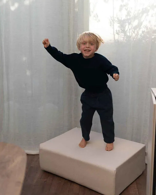 Boy on Trampoline Original Soft Beige