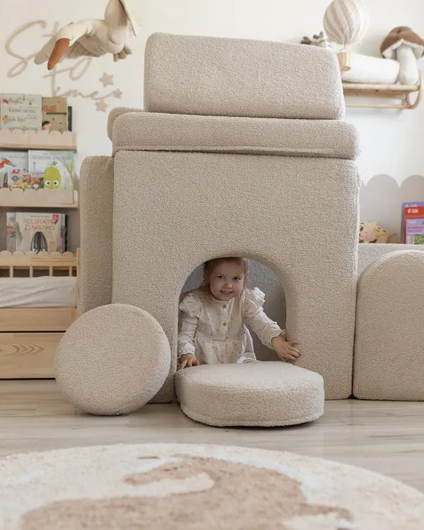 Child inside a house built with Arches Teddy