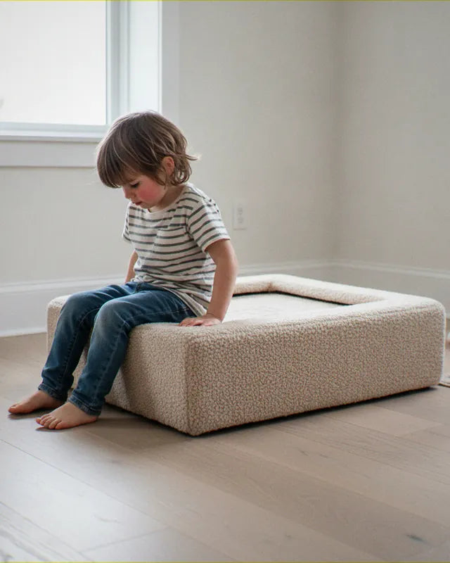 Child sitting on Trampoline Original Teddy Soft Cream