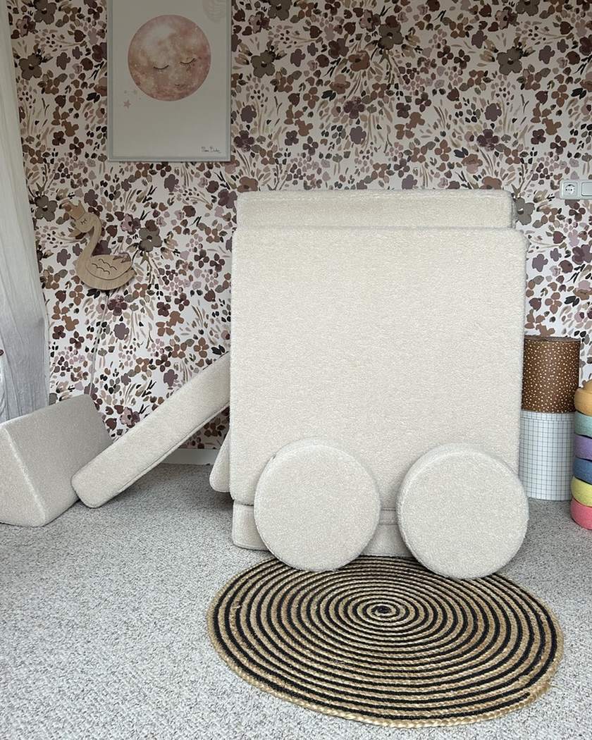 A car built from Play Sofa Original Teddy with round cushions as wheels