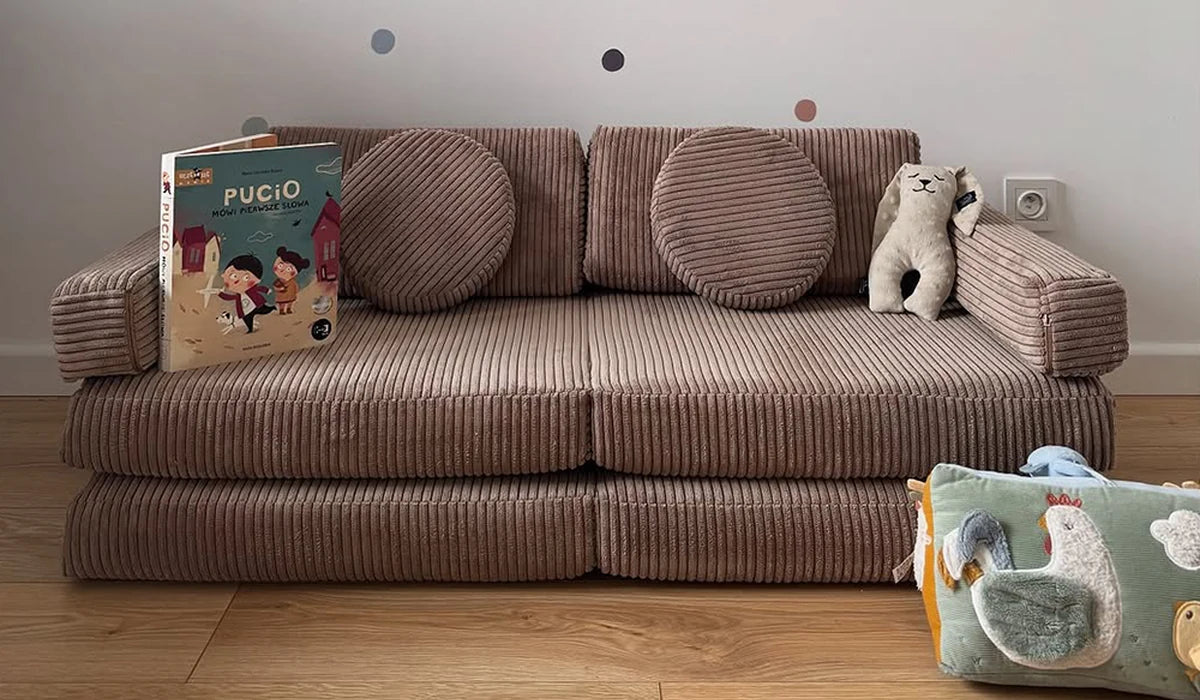 Play Sofa Pure Corduroy Mini in Chocolate as a compact sofa in a child's room