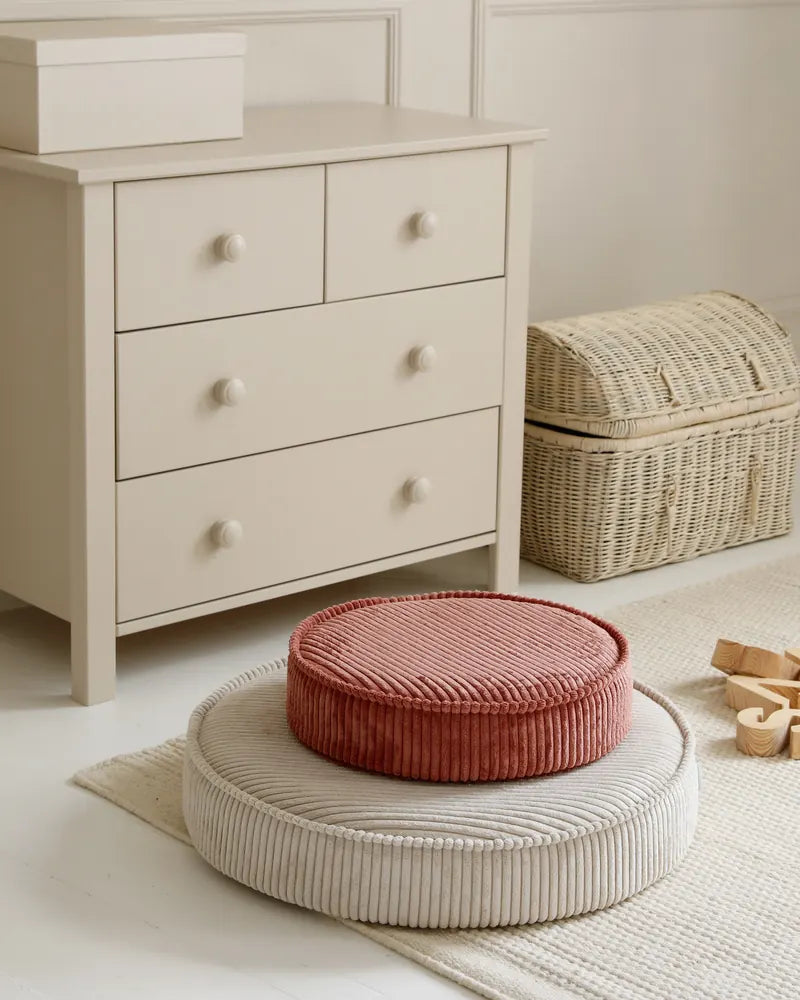 Yuka Pouf Mini in Rose stacked on a Yuka Pouf in Vanilla